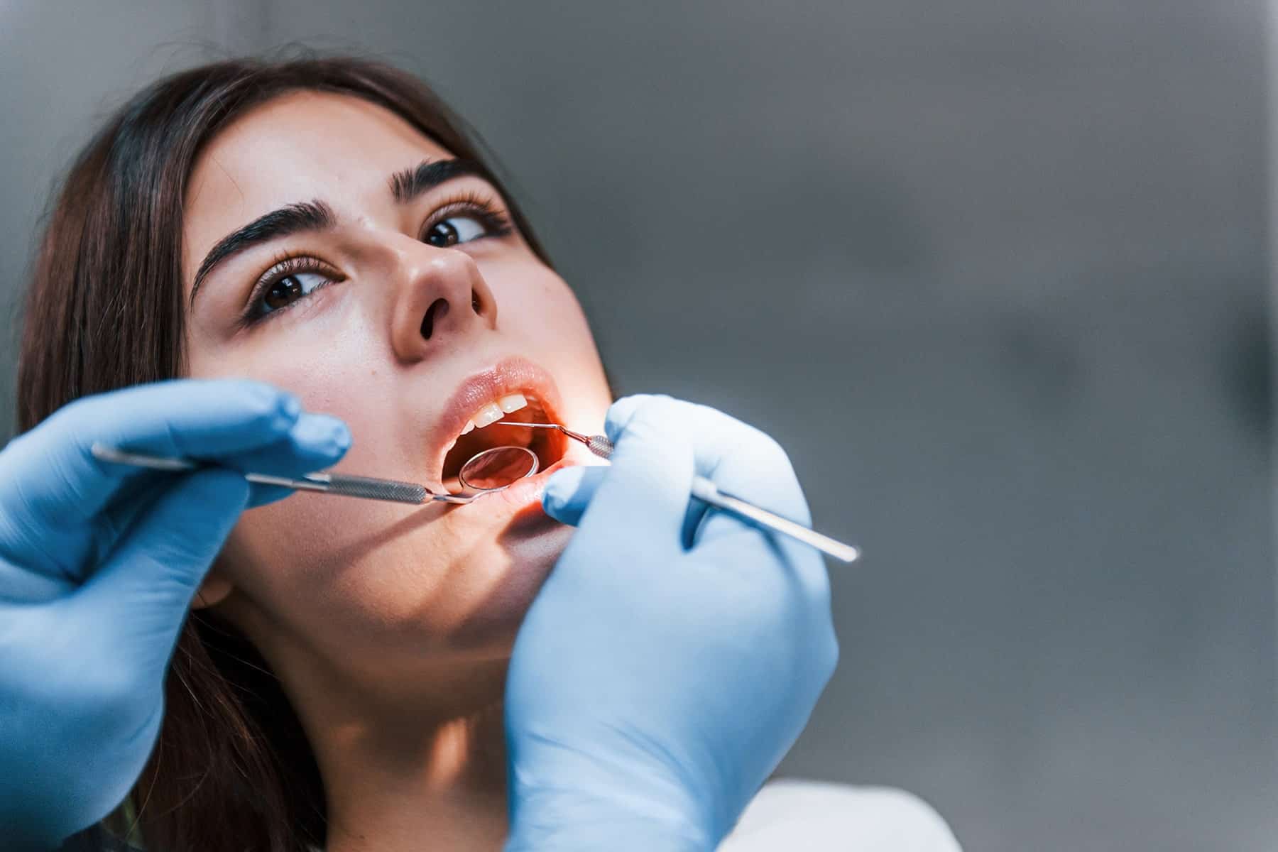 Woman at teeth cleaning appointment in Thornton, CO